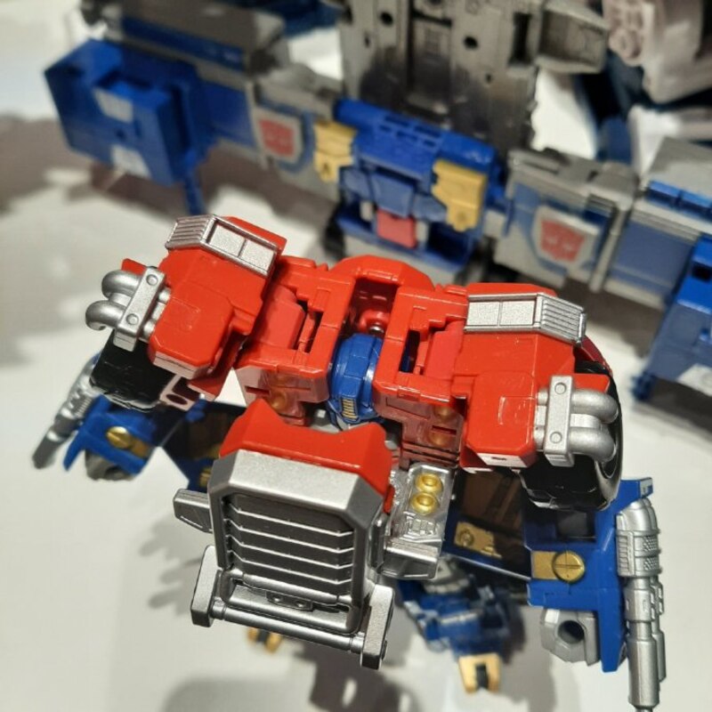 Legacy Evolution Armada Optimus Prime Super Mode In hand Image